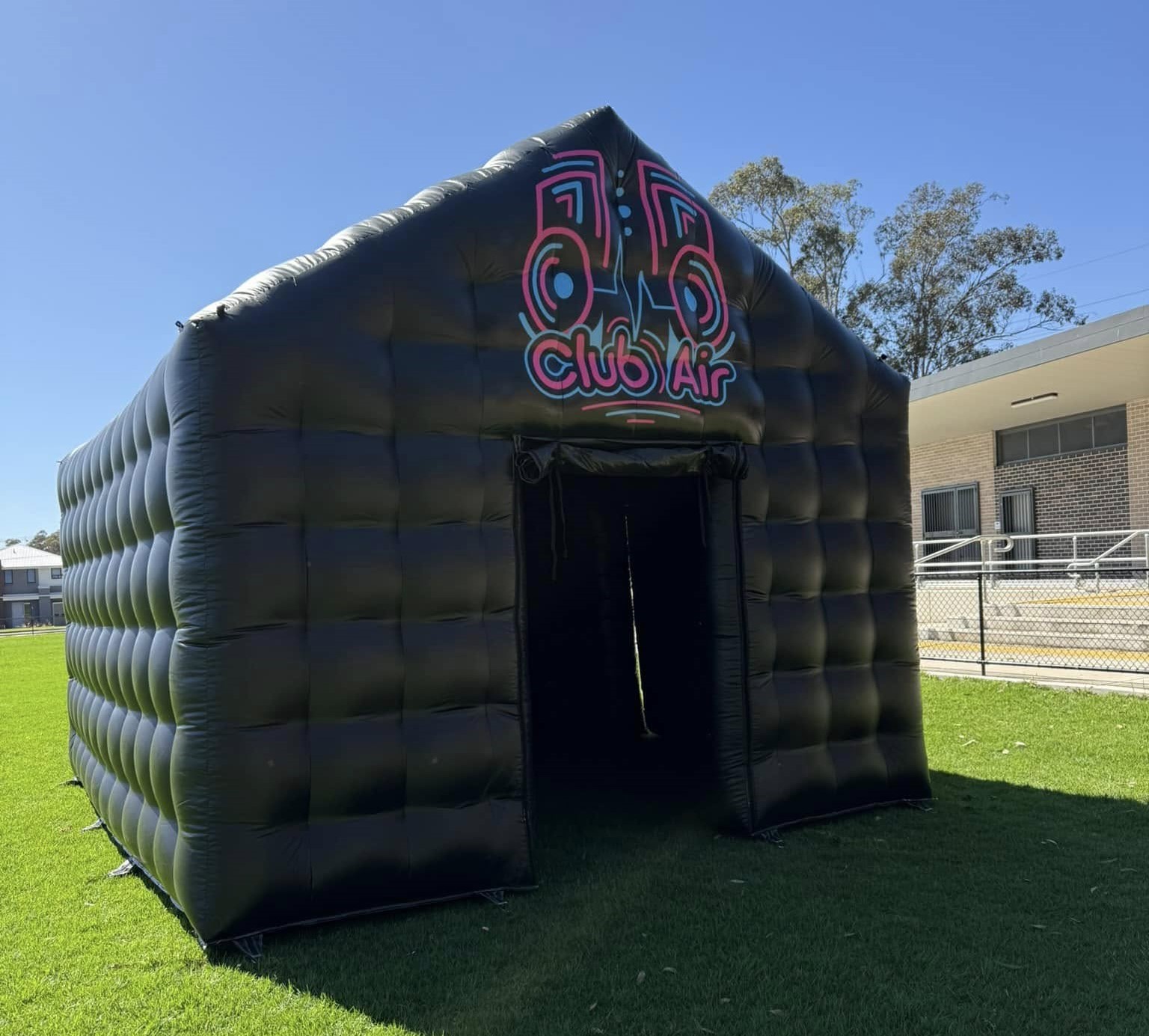 Club Air inflatable nightclub front view in a compact Sydney backyard