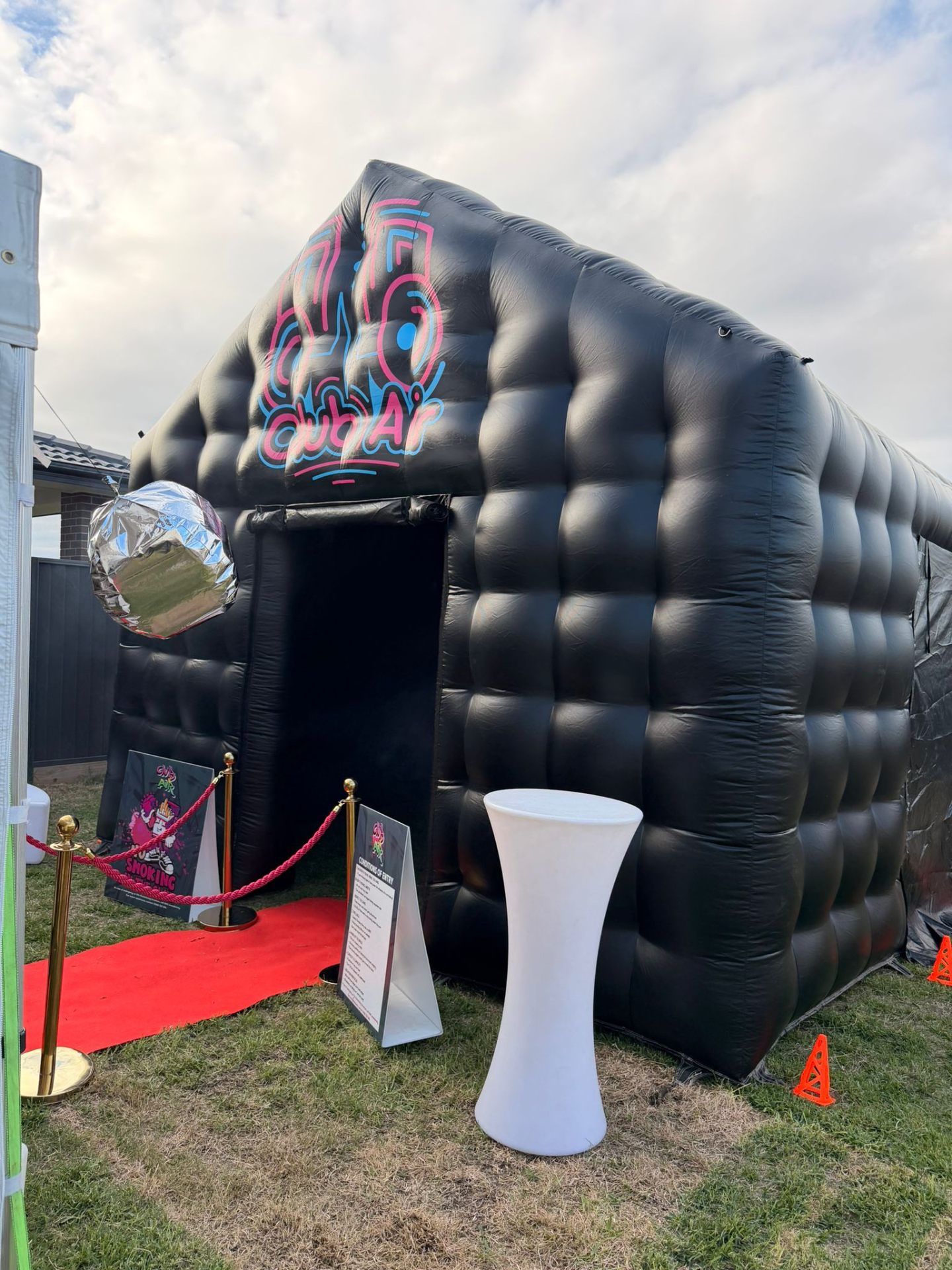 Inflatable disco tent with motorised mirror ball, Sydney backyard