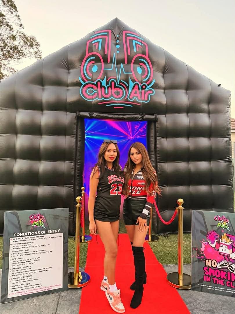 Guests entering the inflatable disco at a Sydney party